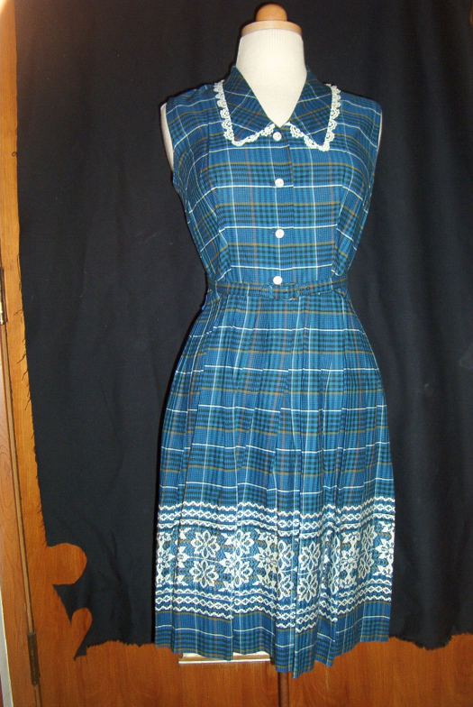 A PRETTY BELTED SHIRTWAIST DRESS FROM THE 1950'S
